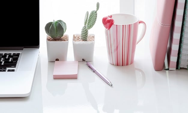 A clean, minimalist desk in a sunlit room. On the desk, there is an open planner, a sleek laptop, a stylish pen holder with colorful pens, and a small potted plant, creating a serene workspace.