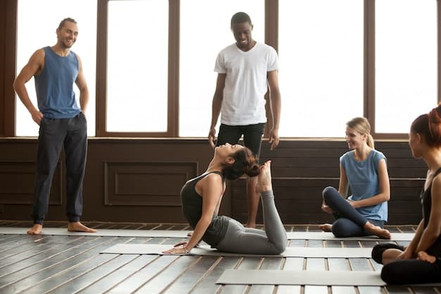 A group of people practicing yoga in a sunlit studio, with an instructor guiding them. The atmosphere is calm and serene, promoting relaxation and mental clarity.