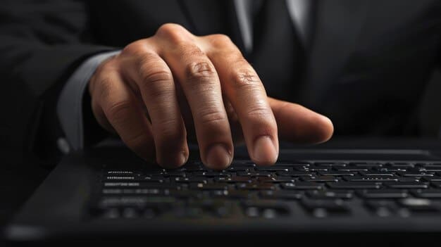 A close-up shot of a hand hovering over a keyboard, highlighting the 