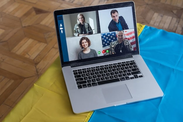 A close-up of a laptop screen displaying a team video conference call with multiple participants in different locations, illustrating global remote collaboration.